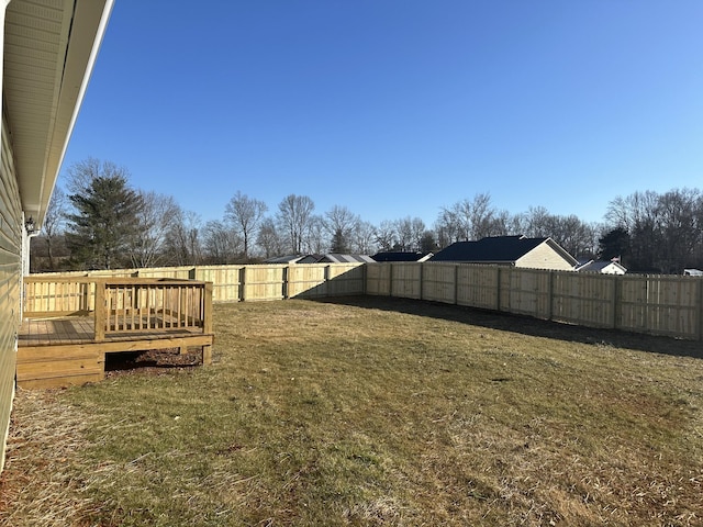 view of yard with a deck