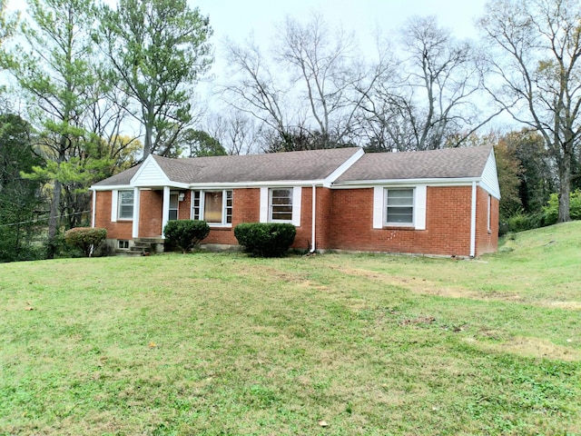 ranch-style house with a front lawn