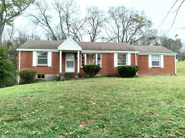 ranch-style house with a front yard