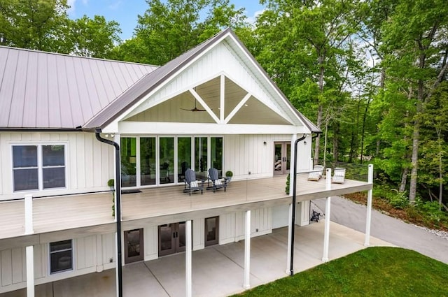 rear view of property with french doors