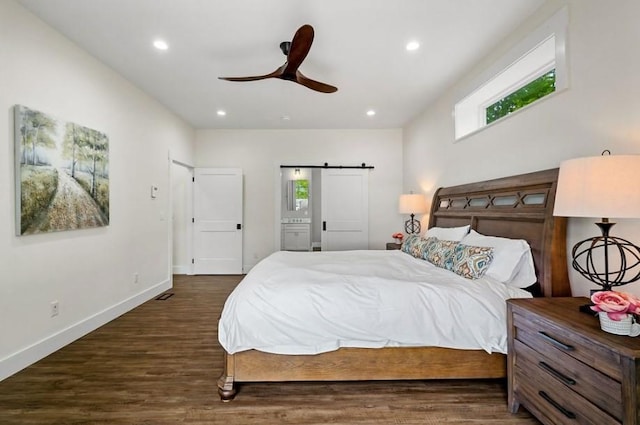 bedroom with ceiling fan and dark wood-type flooring