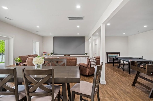 dining space featuring light hardwood / wood-style floors