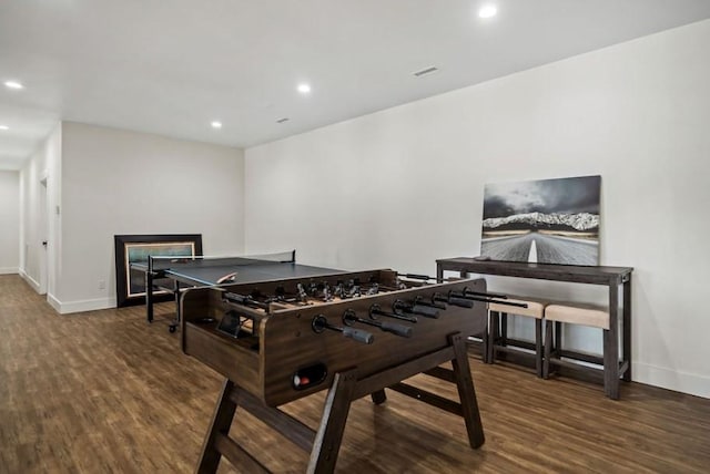 game room featuring dark hardwood / wood-style floors