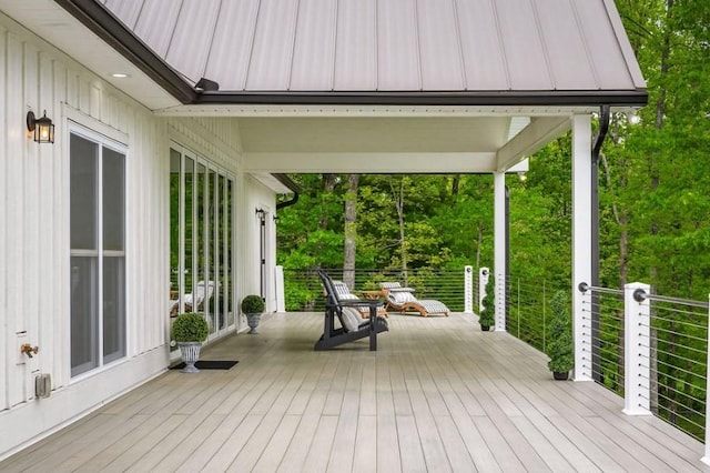 wooden terrace featuring covered porch