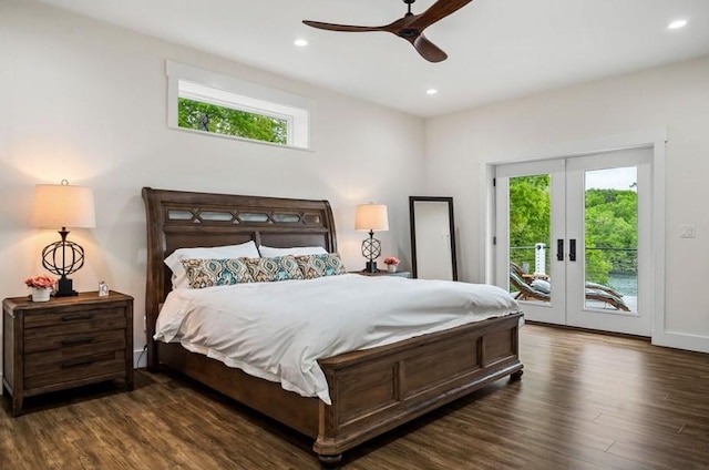 bedroom featuring access to exterior, ceiling fan, french doors, and dark wood-type flooring