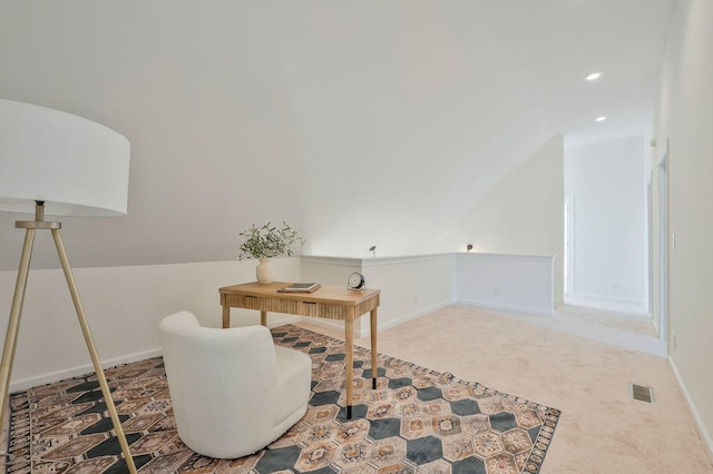 office area featuring carpet flooring and vaulted ceiling