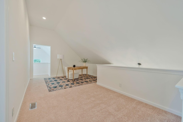 bonus room with light colored carpet, ceiling fan, and lofted ceiling