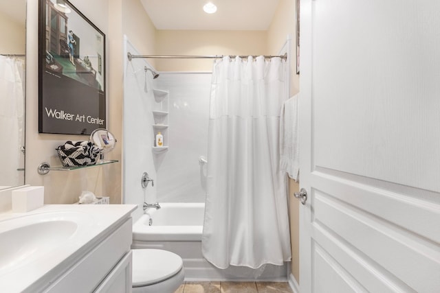 full bathroom featuring vanity, shower / bath combination with curtain, and toilet