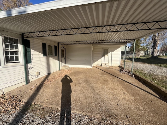 exterior space with a carport