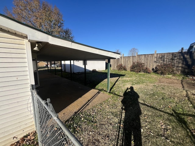 view of yard featuring a carport