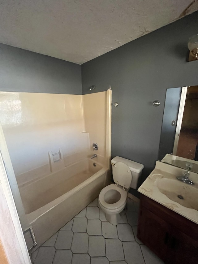 full bathroom with vanity, toilet, and bathtub / shower combination