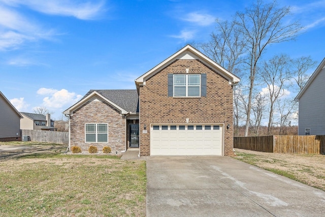 traditional-style home with a garage, driveway, brick siding, and fence