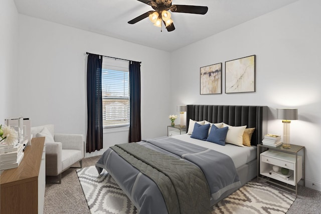 bedroom with carpet floors and a ceiling fan