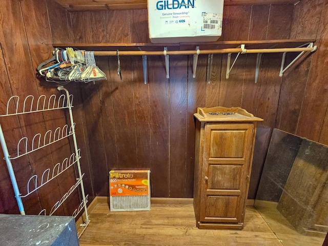 spacious closet featuring hardwood / wood-style flooring