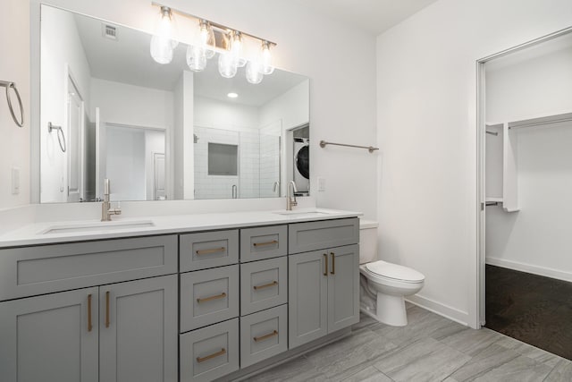 bathroom with toilet, a shower with door, vanity, and hardwood / wood-style flooring