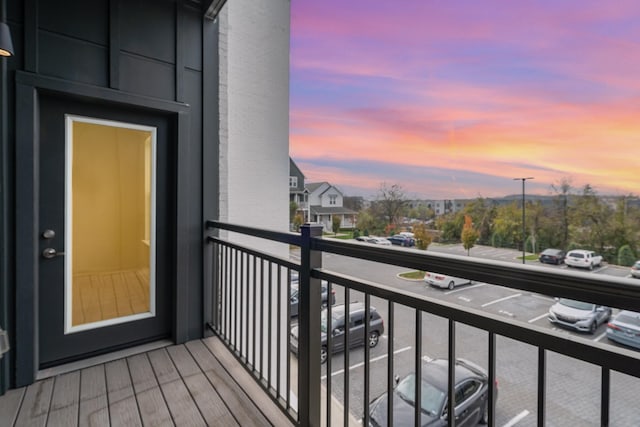 view of balcony at dusk