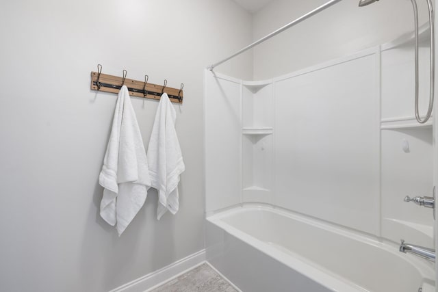 bathroom with shower / bathtub combination