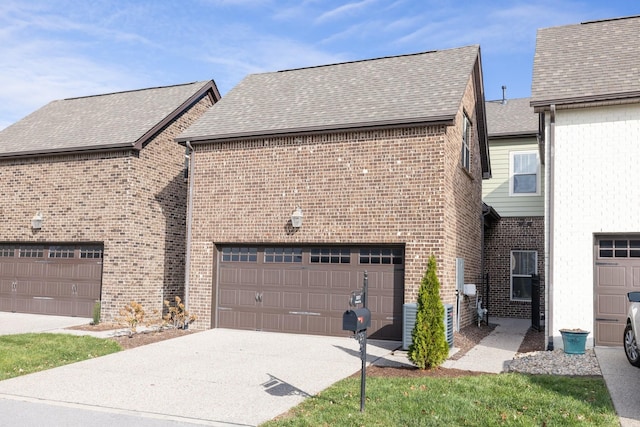 view of side of home with a garage