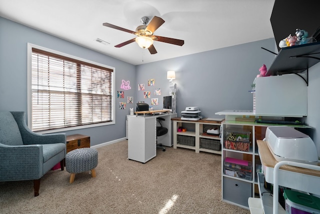 home office featuring carpet and ceiling fan