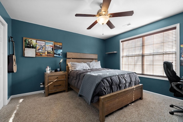 carpeted bedroom featuring ceiling fan