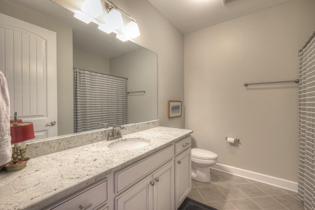 bathroom featuring a shower with curtain, tile patterned flooring, vanity, and toilet