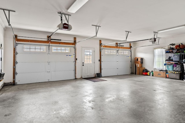 garage featuring a garage door opener