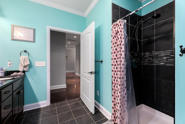 bathroom with tile patterned floors, vanity, curtained shower, and ornamental molding