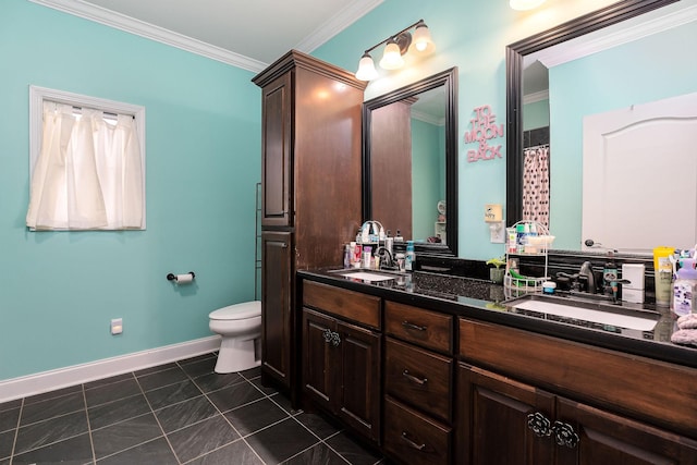 bathroom with tile patterned floors, vanity, toilet, and crown molding