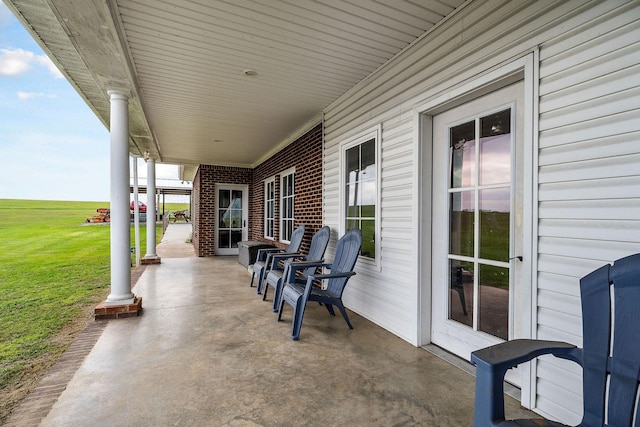 view of patio featuring a porch