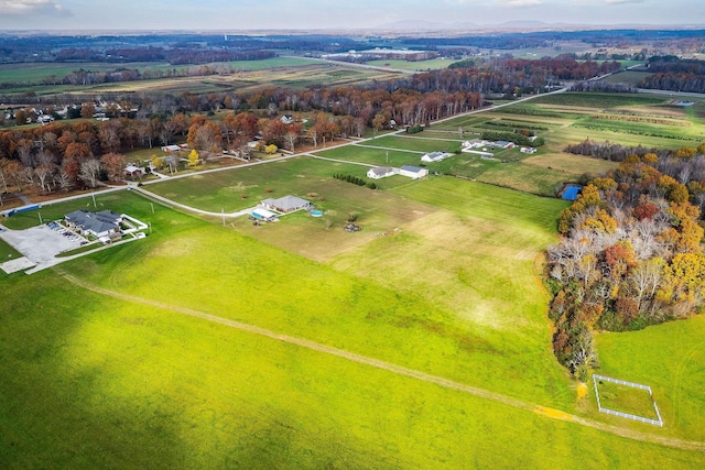 birds eye view of property featuring a rural view