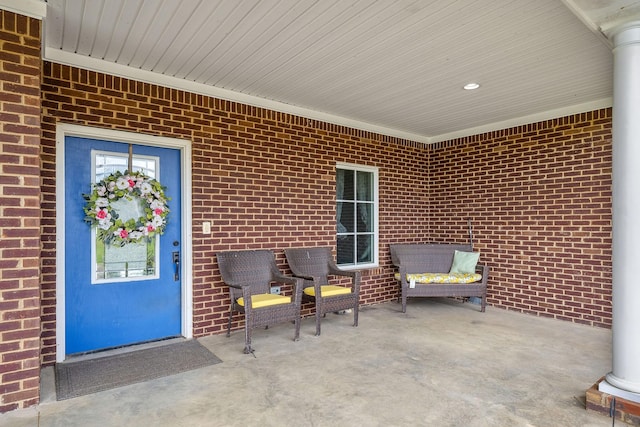 doorway to property with covered porch