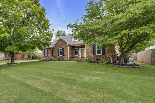 view of front of home featuring a front yard