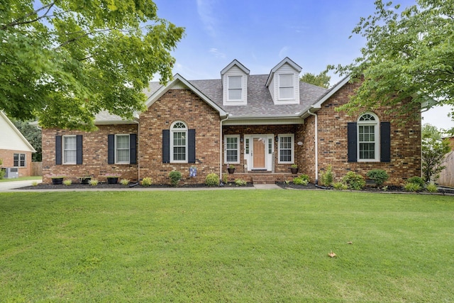 view of front facade featuring a front yard