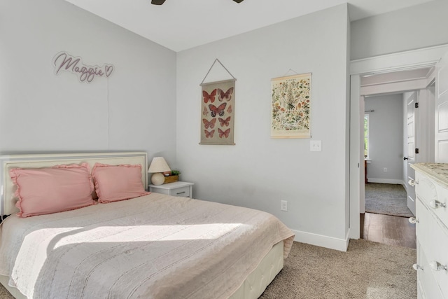 bedroom featuring ceiling fan and light wood-type flooring