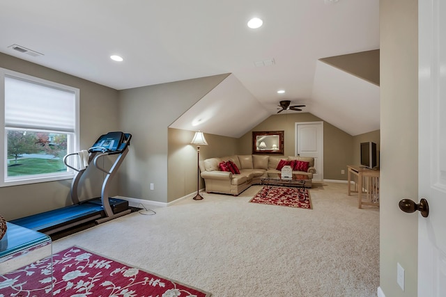 exercise room featuring carpet flooring, ceiling fan, and lofted ceiling