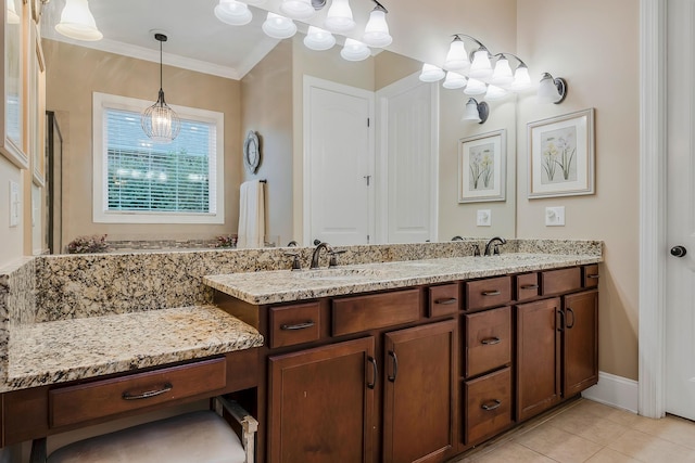 bathroom with tile patterned flooring, vanity, and ornamental molding