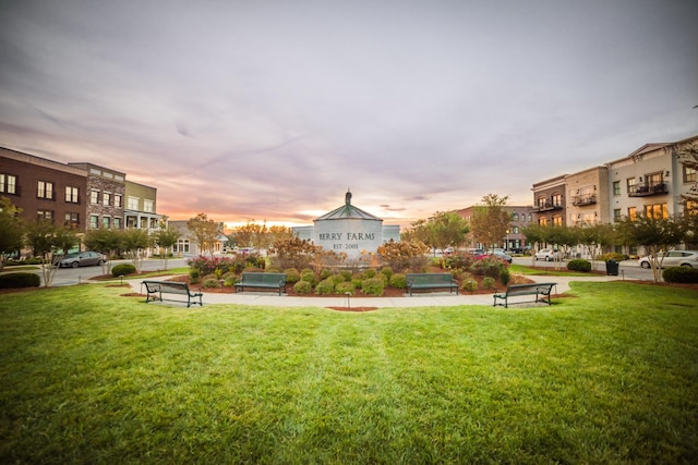 surrounding community with a yard