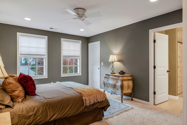 carpeted bedroom featuring ceiling fan