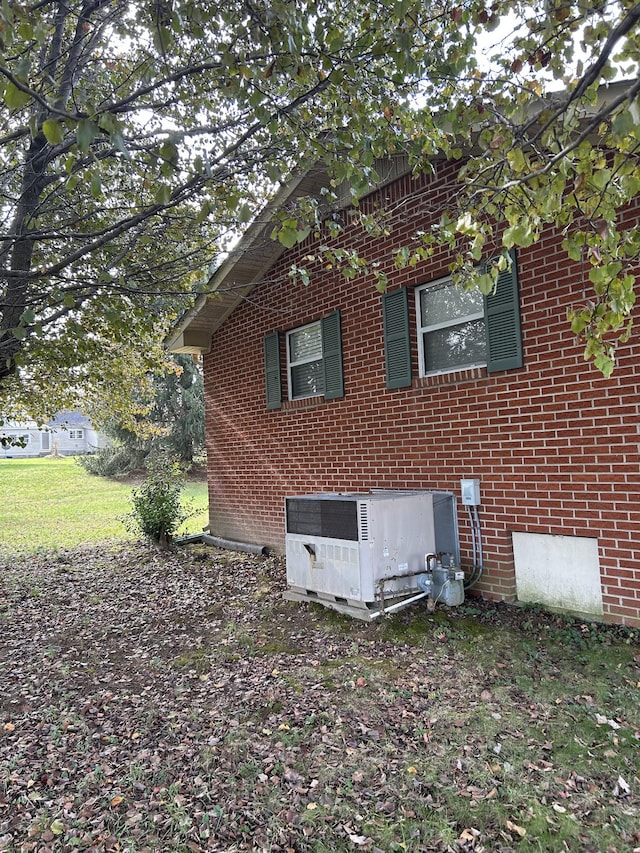 view of home's exterior featuring central AC unit