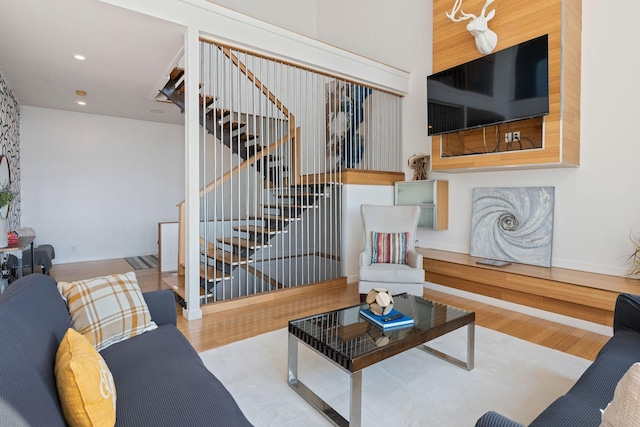 living room with light hardwood / wood-style flooring