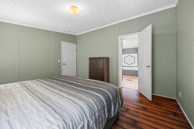 bedroom with a textured ceiling, dark hardwood / wood-style floors, and crown molding