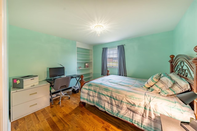 bedroom with wood-type flooring