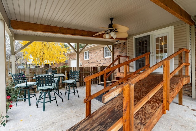 wooden deck with ceiling fan