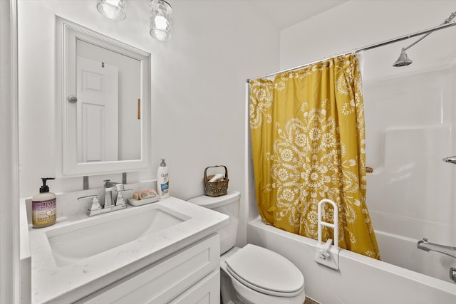 full bathroom with vanity, shower / bath combo, and toilet