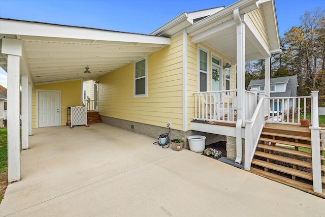 view of side of property featuring a carport