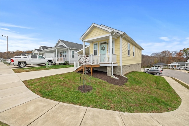 view of front facade with a front yard