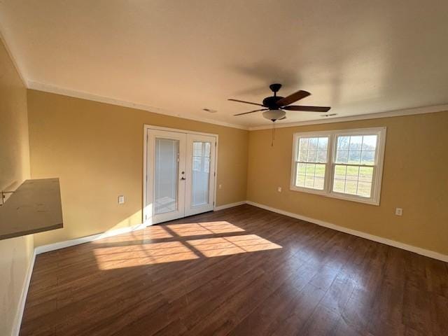 spare room featuring crown molding, french doors, ceiling fan, and hardwood / wood-style flooring