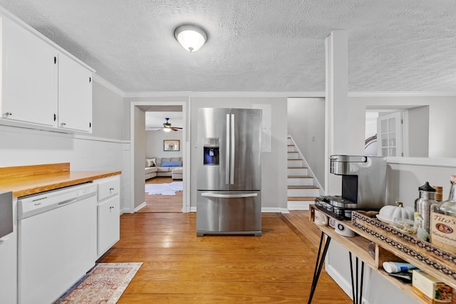 kitchen with stainless steel refrigerator with ice dispenser, light wood-type flooring, a textured ceiling, dishwasher, and white cabinetry