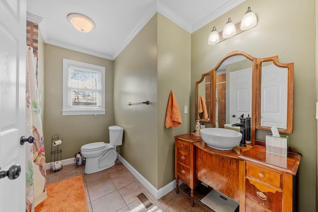 bathroom featuring curtained shower, tile patterned flooring, crown molding, toilet, and vanity