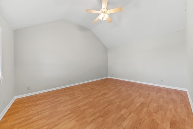 bonus room with light wood-type flooring, ceiling fan, and lofted ceiling